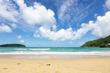 The Turquoise colored sand blue sky on sunny day and space on the sky and cloud
