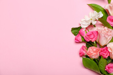 Naklejka na ściany i meble Beautiful flowers on pink background, top view