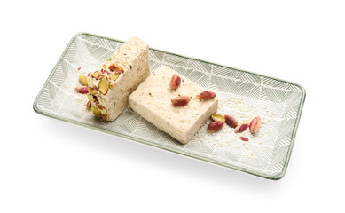 Plate of tasty sesame halva with pistachios on white background