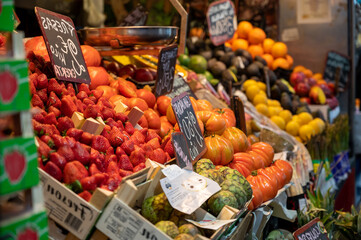 Colorful fresh ripe fruits and vegetables on farmers market in Spain