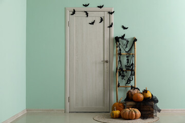 Interior of hall decorated for Halloween with door and ladder