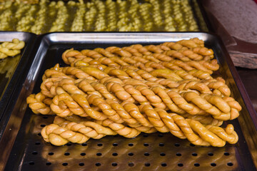 Fried dough twist - traditional snacks.