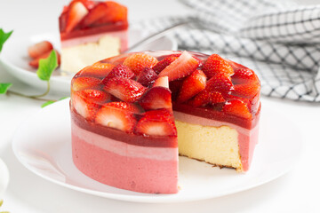Homemade strawberry cheesecake with jelly and fresh strawberries