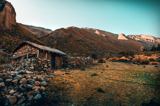 beautiful place stone house in sunset with its blue sky