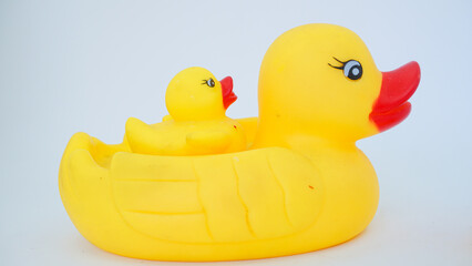 Yellow rubber ducks isolated on a white background. Big rubber duck and small rubber ducks. baby and mother duck