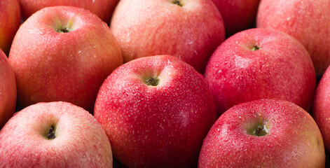 Red ripe apples texture background