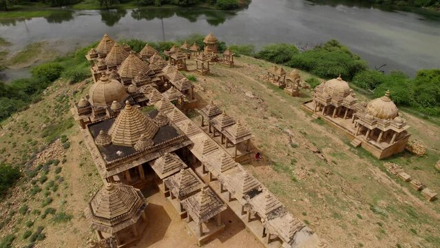 Incredible aerial backward view of Bada Bagh cenotaphs with river in background. Tourism in Jaisalmer, golden city.