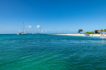Tropical white beach with crystalline water in "Dos Mosquises" islands (Los Roques Archipelago, Venezuela).