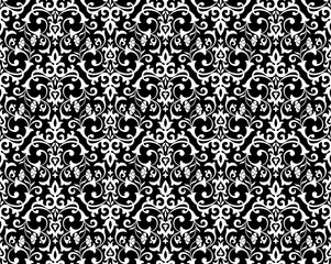Floral pattern. Vintage wallpaper in the Baroque style. Seamless vector background. White and black ornament for fabric, wallpaper, packaging. Ornate Damask flower ornament