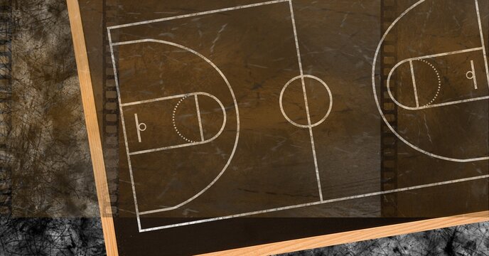 Composition of brown and black basketball court overhead view over textured black background