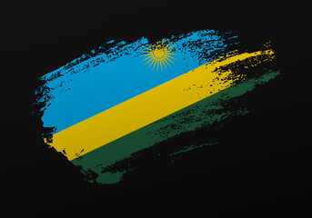 Abstract creative patriotic hand painted stain brush flag of Rwanda on black background