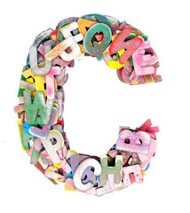 The letter C made up of lots of painted small wooden letters