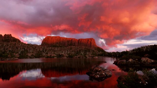 a panning clip of an incredible red sunset at mt geryon and the acropolis at the labyrinth in cradle mountain-lake st clair national park of tasmania, australia