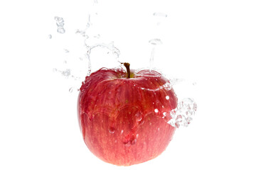 Fototapeta na wymiar リンゴと水しぶき