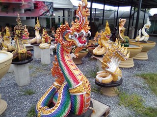 Fototapeta premium Naga statue in the shop.