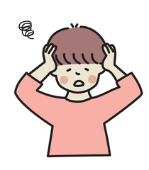 頭を抱える男性