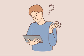 Confused man shocked by problem on tablet 