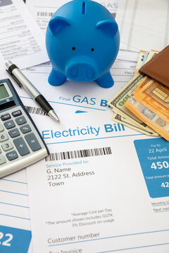 Energy cost increase and saving. Electricity gas bills and piggy bank.