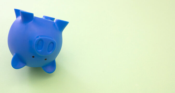 Piggy Bank Upside Down. Economic Crisis, Savings In Risk Concept.