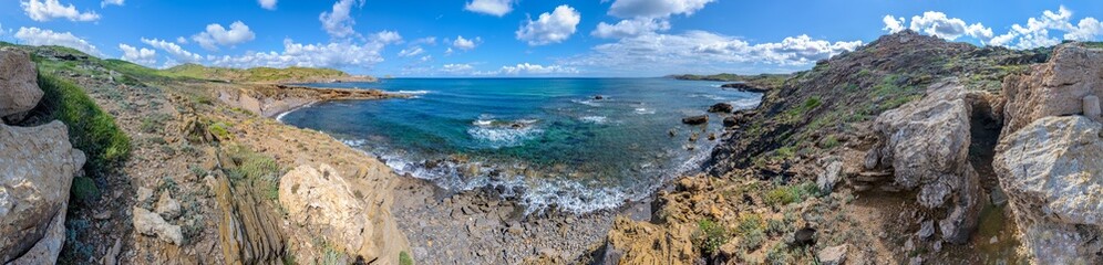 Fototapeta na wymiar Ses Pesqueres Beach in Menorca, spain