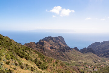 Panoramic view on rock formation Roque de la Fortaleza near remote village Masca in Teno mountain massif, Tenerife, Canary Islands, Spain, Europe. Coastal scenic hiking trail along the Atlantic Ocean