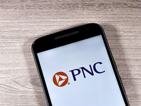 In this photo illustration the PNC Financial Services Group logo is displayed on a smartphone.