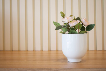 Flower pot with pattern wooden wallpaper background, copy space.