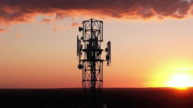 Aerial View of Tower Antenna Telecommunication Cell Phone, Radio Transmitters of Cellular 5g 4g Mobile Phone. Cellular Mobile Signals Providing High Speed 4g and Modern 5g Traffic Network Service.