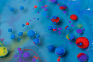 Abstract art with colored, blue and red circles with depth.