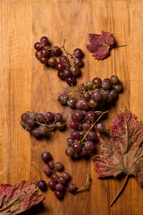 organic grapes on a wooden background