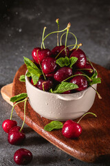 Fresh cherry in close up view on dark background