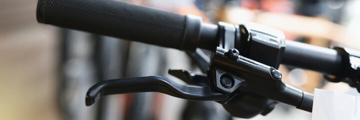 Bicycle handlebar with handbrake in parking closeup