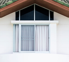 Glass window on modern white house