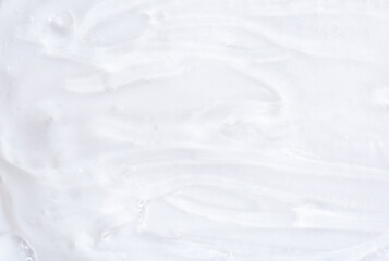 Hyaluronic acid or collagen gel close up. Textured background with oxygen bubbles in cosmetics. Moisturizing serum for the skin.