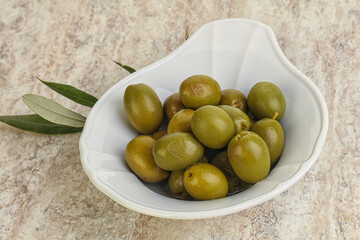 Tasty marinated olives in the bowl