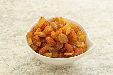Sweet yellow raisin in the bowl