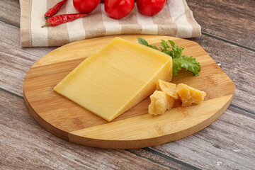 Parmesan hard cheese with small pieces