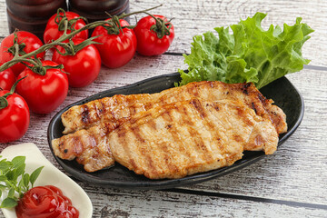 Grilled pork steak with ketchup