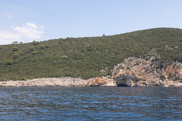 View from the sea to the hilly coast.