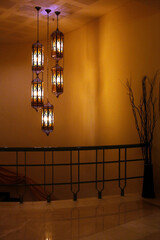 The chandelier in the hotel reception nice golden background  