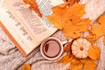 Autumn composition book, cup of coffee, pumpkin and leaves