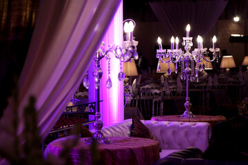 wedding reception table with nice purple light