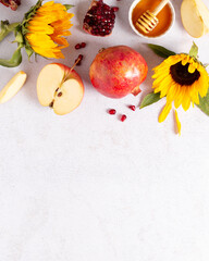 Jewish holiday Rosh Hashanah greeting card with apples, honey and flowers, autumn web banner with fruits and flowers