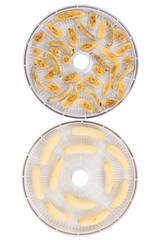 on a white background, two round grids, dried peeled bananas and fresh