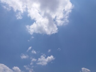 White clouds almost cover the blue sky or bright blue sky and are full of white clouds during the day