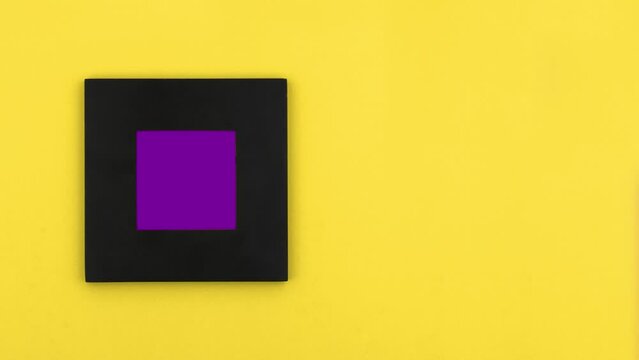Squared photo frame enters and exits the scene from the bottom screen site. Purple screen.