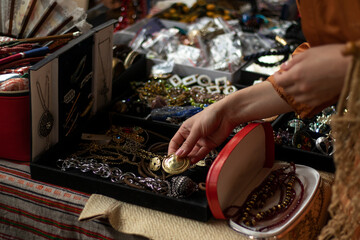 Retro jewelry at the vintage market. Close-up.