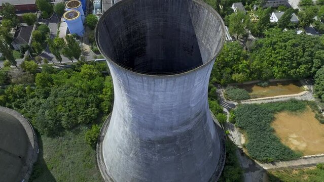 Aerial View Hyperboloid Cooling Tower Of HeidelbergCement Militari Concrete Plant In Bucharest, Romania.