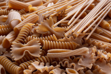 Obraz na płótnie Canvas pile of whole durum wheat pasta