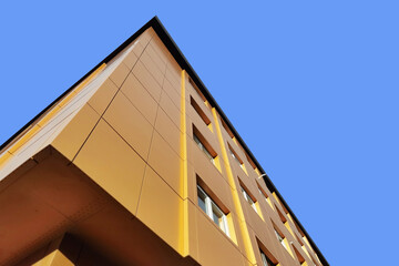 restoration and improvement of building for facade protection with modern  aluminum panels , selective focus